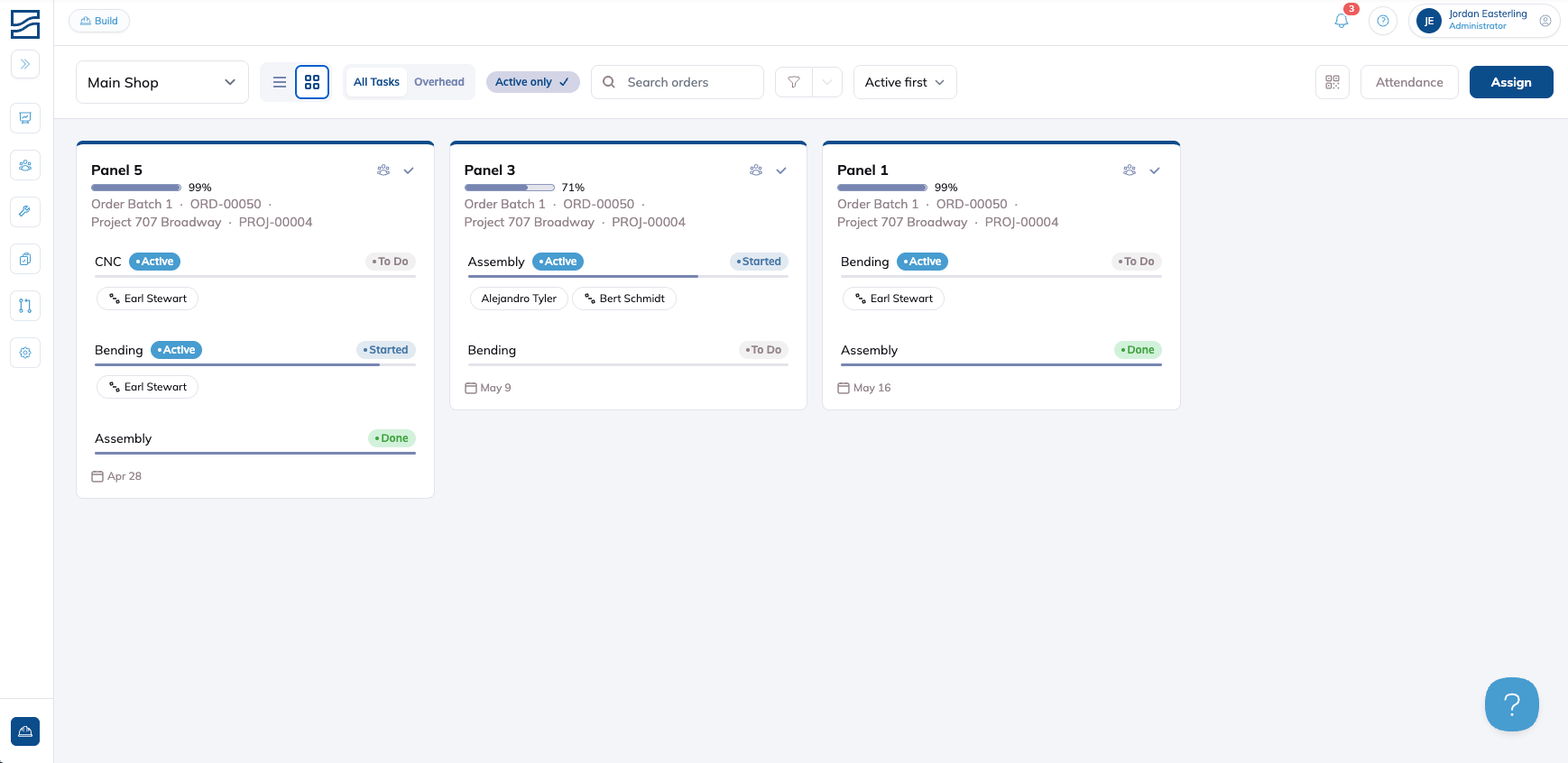 The Build page in grid view, showing each unit as a card with its order and project, its route stages carrying Active badges, and the crew members assigned to each stage.