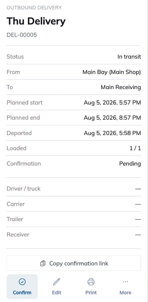 The same page with the trip in transit. Status reads In transit, Departed is stamped, and the action row shows Confirm.
