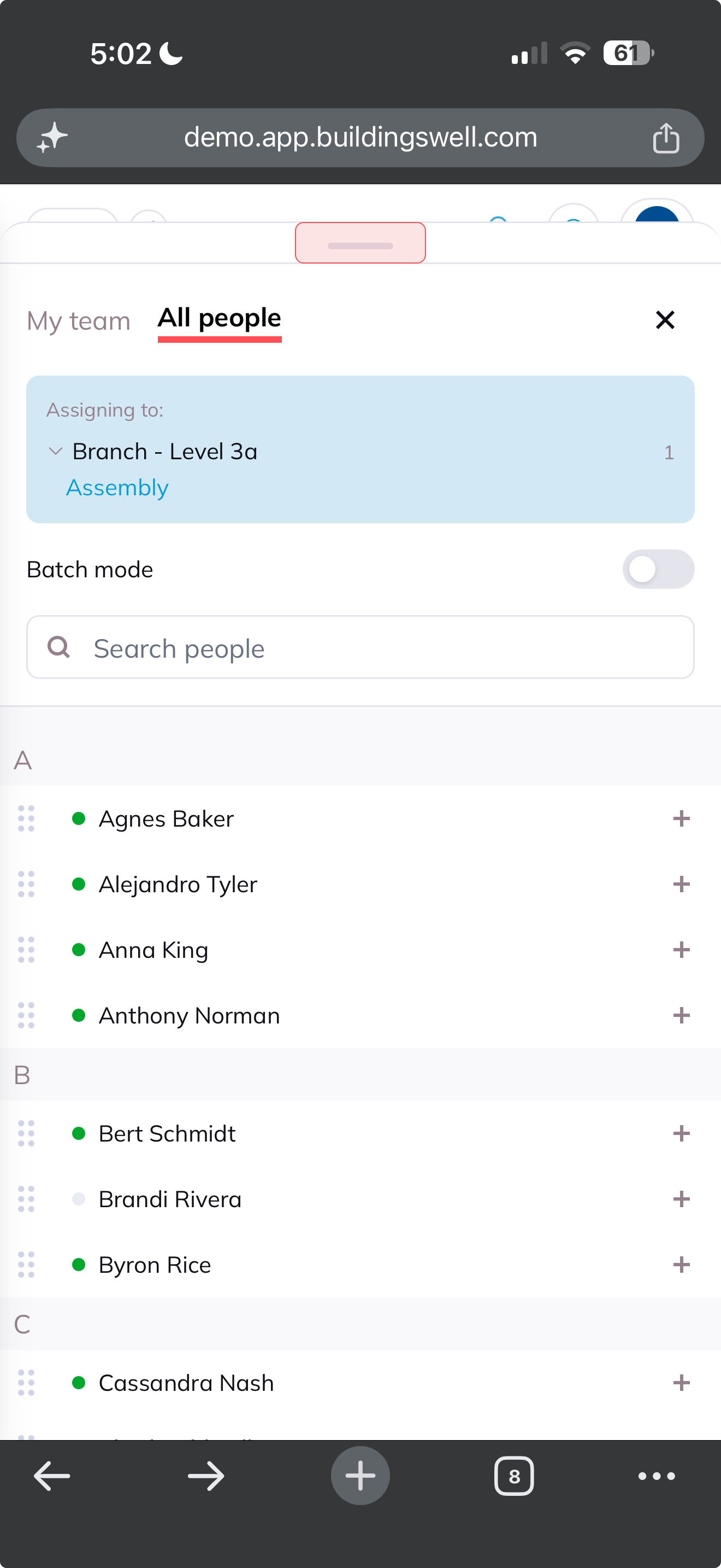 The assignment tray open on a phone, showing the stage being assigned to, a Batch mode toggle, and the list of people with their availability.