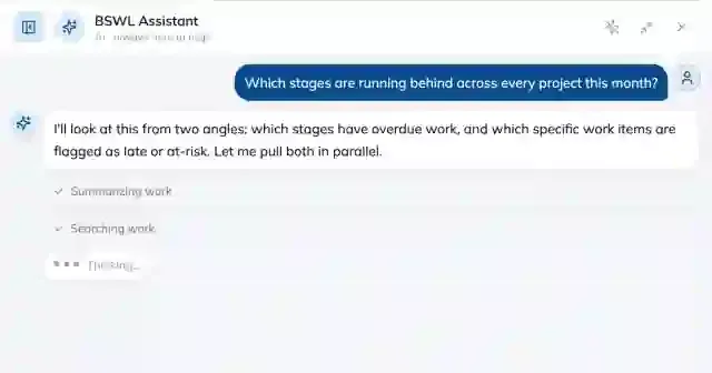 The assistant part way through an answer, showing the Summarizing work and Searching work activity labels above a Thinking indicator.