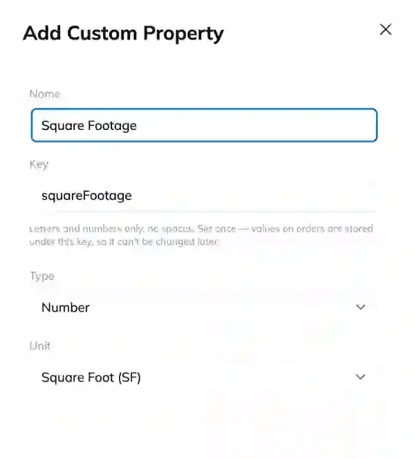 The Add Custom Property panel with a name, an auto-filled key, type Number and a unit of Square Foot.